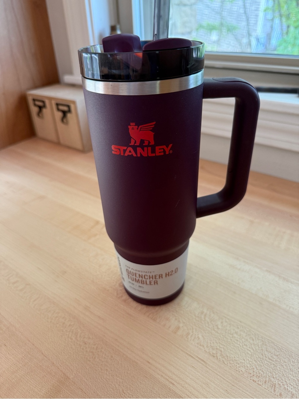 Insulated Purple Stanley Travel Mug with Handle and Straw
